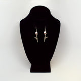 Skull with Red Austrian Crystal Eyes and Dangling Guns Silver Finish Dangle Earrings #977